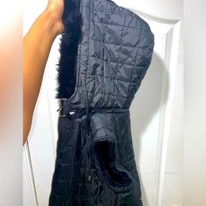 Black vest with Faux Fur lining. Detachable hoodie. Size medium